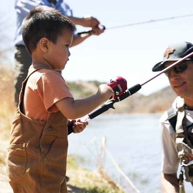 Boy fishing, from the film, "Nuestra Agua, Nuestro Futuro"