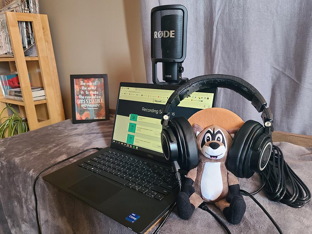 Recording studio featuring a Ranger Rick stuffed animal wearing headphones.
